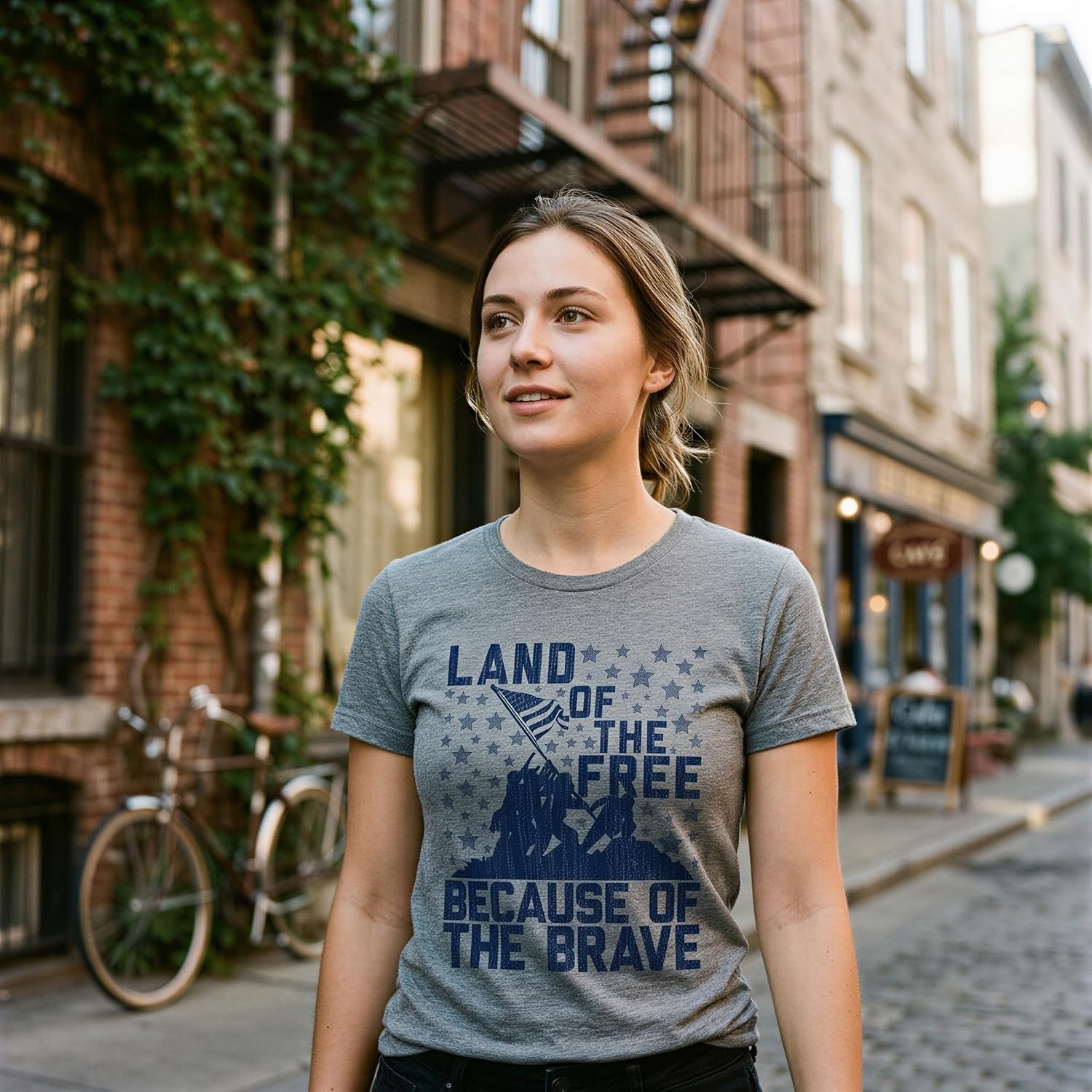 image:imageLand of The Free Because of The Brave 4th of July Shirt for WomenDark Heather Grey